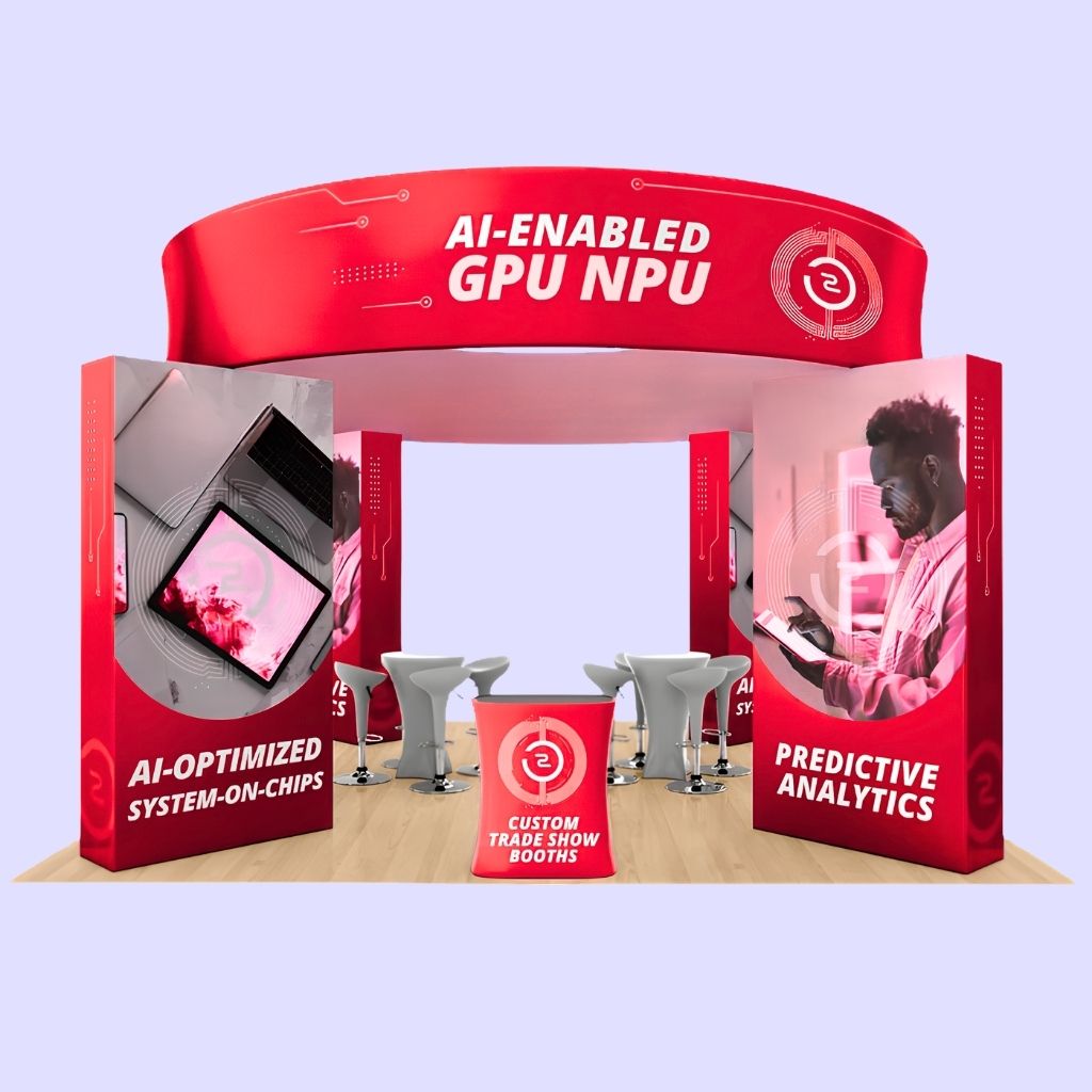 Fabric tube island exhibition stand with four printed corner towers, a curved overhead header ring and a printed counter, set up with bar tables and stools