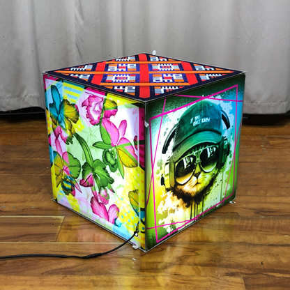 Backlit fabric cube display printed on five faces and lit from the inside