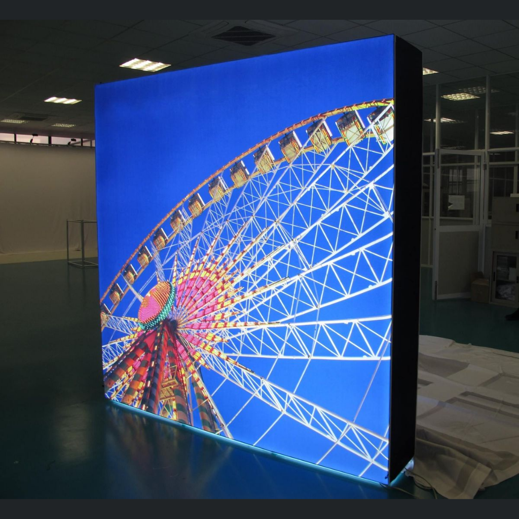 3m wide x 2.25m high SEG backlit pop up media wall at showroom